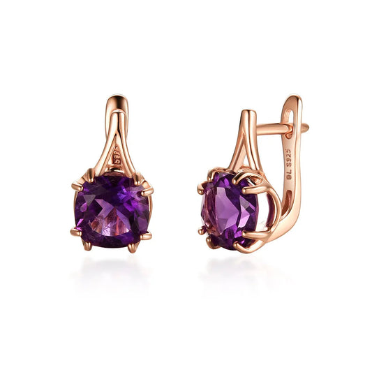 Rose gold earrings with purple gemstones 