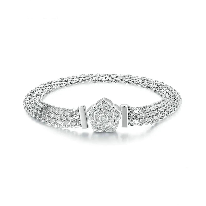 Silver bracelet with a floral clasp