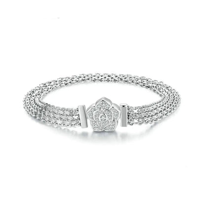 Silver bracelet with a floral clasp